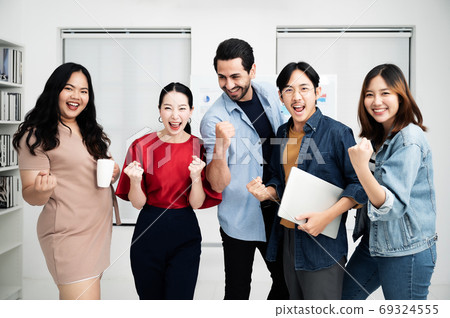 Portrait of business teamwork standing together feeling happy and smile Portrait of business teamwork standing together feeling happy and smile 69324555