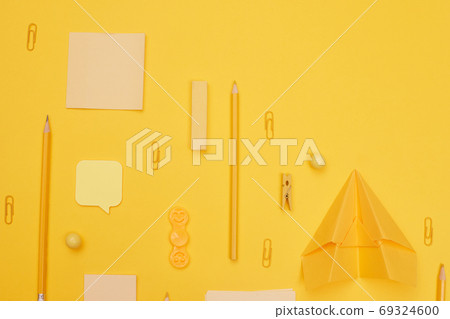 back to school, school supplies lying parallel on yellow background, copy space, top view 69324600
