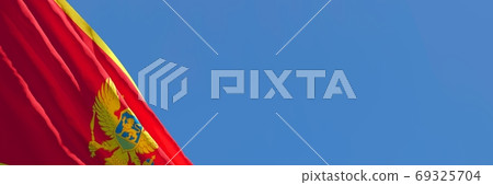 3D rendering of the national flag of Montenegro waving in the wind 69325704