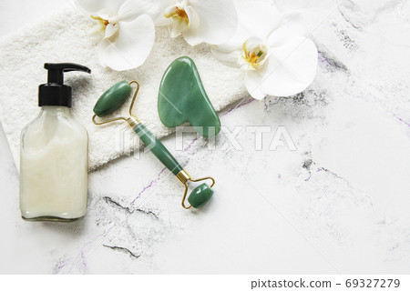 Jade face roller, spa concept 69327279