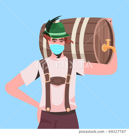 man in medical mask holding beer barrel Oktoberfest party celebration coronavirus quarantine concept man in medical mask holding beer barrel Oktoberfest party celebration coronavirus quarantine concept 69327787