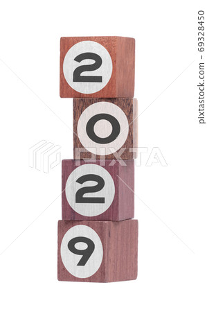Four isolated hardwood toy blocks, saying 2029 Four isolated hardwood toy blocks, saying 2029 69328450
