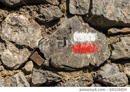Red and White Trail Sign on a Stone Wall - Liguria Italy Red and White Trail Sign on a Stone Wall - Liguria Italy 69329804