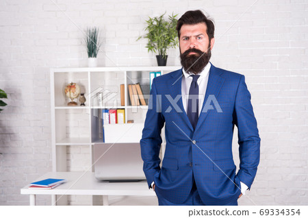 Making career. Boss in office. Man beaded hipster launched startup project. Company owner Making career. Boss in office. Man beaded hipster launched startup project. Company owner 69334354