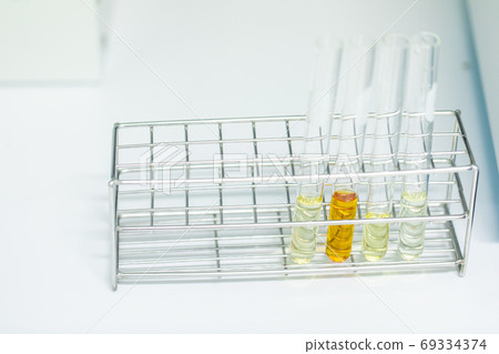 Sample analysis using Spectrophotometer for lab experiments. Sample analysis using Spectrophotometer for lab experiments. 69334374