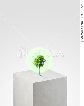 Surrealism--A tree full of energy on a square platform 69335225