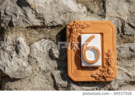 House Number 6 on the wall in Liguria Italy House Number 6 on the wall in Liguria Italy 69337508