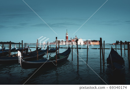 gondolal at night and San Giorgio Maggiore church, Venice, Italy gondolal at night and San Giorgio Maggiore church, Venice, Italy 69340174