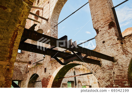 Landscape of ruined buildings at sunset, image of decrepitude or natural disaster. Landscape of ruined buildings at sunset, image of decrepitude or natural disaster. 69342199