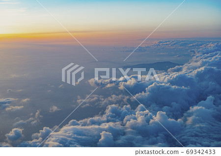 Evening view from the window of a passenger plane Evening view from the window of a passenger plane 69342433