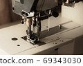 Industrial flat-seam sewing machine. Soft focus 69343030