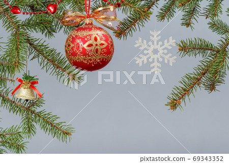 Branches of fir tree with Christmas ornament Branches of fir tree with Christmas ornament 69343352