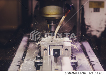 machine for welding steel pipes in a factory. machine for welding steel pipes in a factory. 69343370