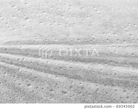 Wet cloth surface, background with drops Wet cloth surface, background with drops 69345002