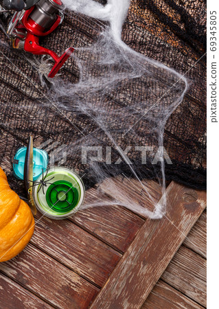 Fishing tacles on wooden background in Halloween designe with sp Fishing tacles on wooden background in Halloween designe with sp 69345805