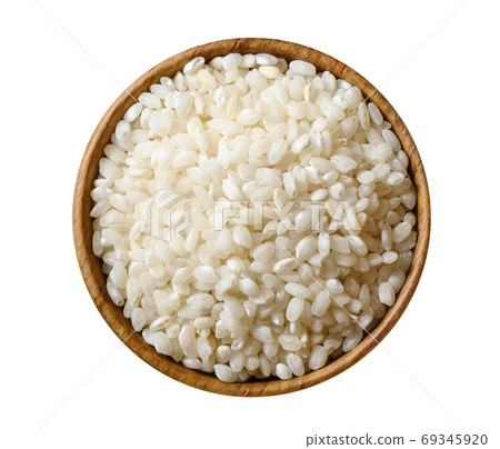 Dry white rice isolated on white background. 69345920