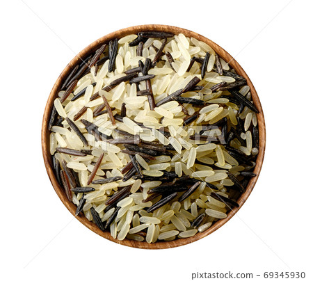 Mixed rice in wooden bowl isolated on white. 69345930