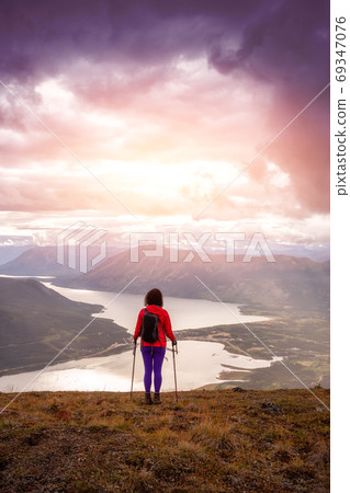 Adventurous Girl Hiking on the Mountain 69347076