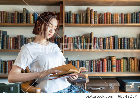 Image of reading A woman reading a book Image of reading A woman reading a book 69348217
