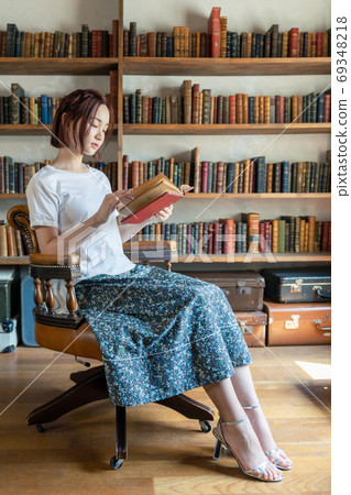 Image of reading A woman reading a book Image of reading A woman reading a book 69348218