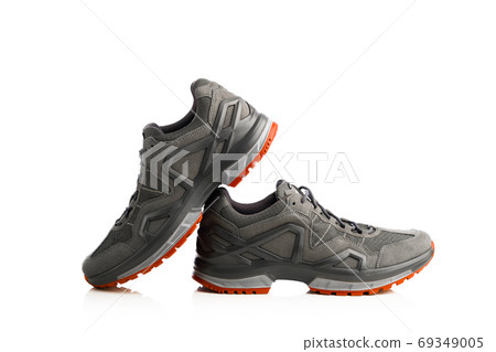 trekking sneakers with red sole, isolated on white trekking sneakers with red sole, isolated on white 69349005