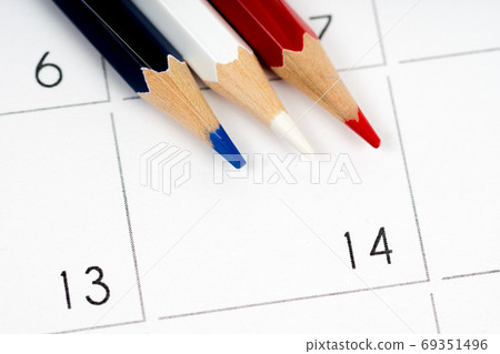 red white blue pencils on empty calendar grid 69351496