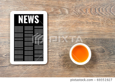 online news on white digital tablet, modern businessman morning online news on white digital tablet, modern businessman morning 69351927