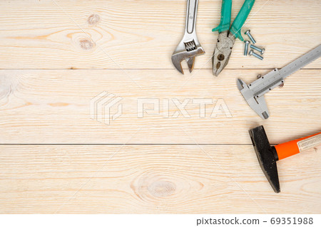 hand tools on wooden planks 69351988