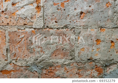 broken red bricks wall, texture close-up shot broken red bricks wall, texture close-up shot 69352279