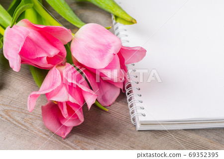 tender pink tulips on wooden table, birthday wedding or valentine background 69352395
