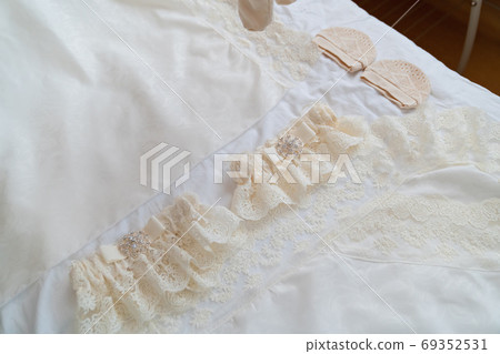 hats, clothes for discharge of twins in hospital. hats, clothes for discharge of twins in hospital. 69352531