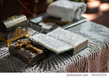 Orthodox church prayer book at wedding or baptism Orthodox church prayer book at wedding or baptism 69352978