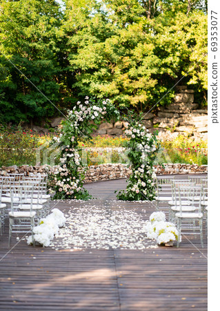 area for outdoor wedding ceremony in the open air. area for outdoor wedding ceremony in the open air. 69353077