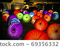 Night illuminated by a colorful Japanese umbrella 69356332