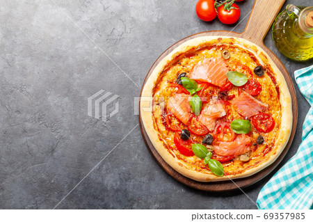 Tasty homemade seafood pizza with salmon 69357985
