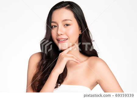 Beautiful young asian woman with clean fresh skin on white background, Face care, Facial treatment Beautiful young asian woman with clean fresh skin on white background, Face care, Facial treatment 69359339
