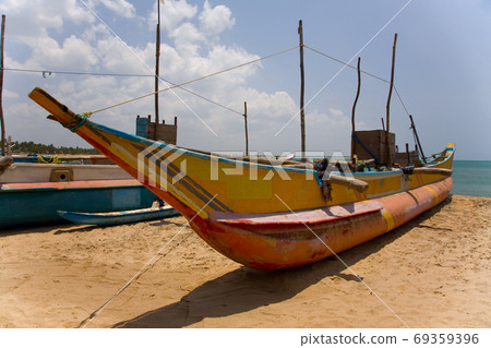 Fishing boat in beautiful beach 69359396