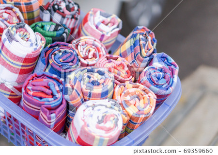 Spool of thread use for weaving traditional Thai cotton.Natural Spool of thread use for weaving traditional Thai cotton.Natural 69359660