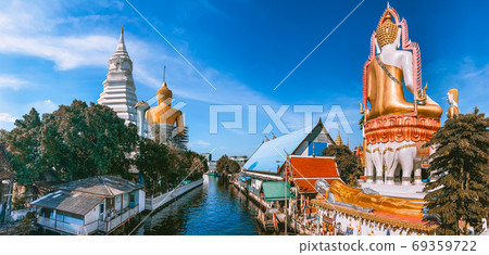 Around the khlong near Wat Paknam Bhasicharoen, a temple, pagoda and Buddha statue in Bangkok Around the khlong near Wat Paknam Bhasicharoen, a temple, pagoda and Buddha statue in Bangkok 69359722