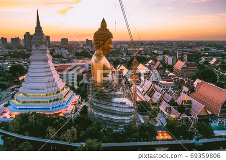 Aerial view of Wat Paknam Bhasicharoen, a temple, pagoda and Buddha statue in Bangkok Thailand Aerial view of Wat Paknam Bhasicharoen, a temple, pagoda and Buddha statue in Bangkok Thailand 69359806