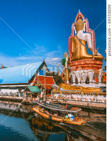 Around the khlong near Wat Paknam Bhasicharoen, a temple, pagoda and Buddha statue in Bangkok Around the khlong near Wat Paknam Bhasicharoen, a temple, pagoda and Buddha statue in Bangkok 69359899