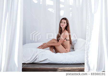 Young Woman wearing bikini enjoying her summer 69360191