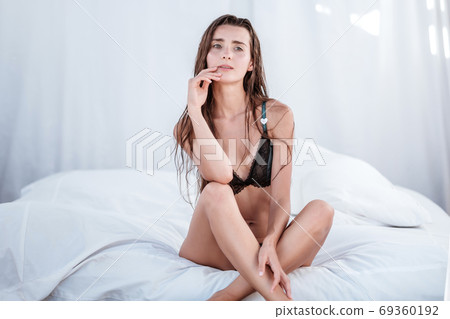 Young Woman wearing bikini enjoying her summer Young Woman wearing bikini enjoying her summer 69360192