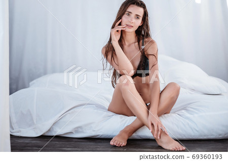 Young Woman wearing bikini enjoying her summer Young Woman wearing bikini enjoying her summer 69360193