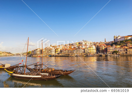 Porto Portugal city skyline at Porto Ribeira and Douro River with Rabelo wine boat 69361019