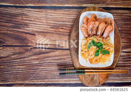 Udon noodles and fried cocktail prawns. copy space Udon noodles and fried cocktail prawns. copy space 69361625