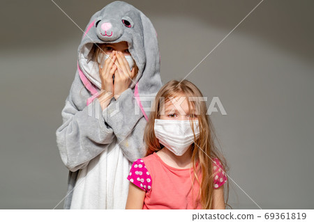 kids in pajamas and masks in quarantine epidemic kids in pajamas and masks in quarantine epidemic 69361819
