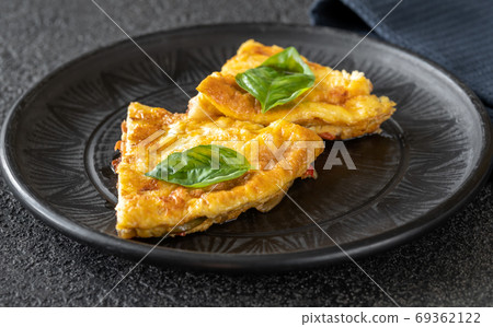 Frittata with vegetables and cheese Frittata with vegetables and cheese 69362122