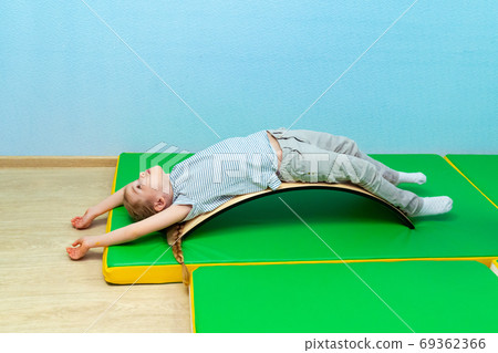 girl is lying on back on touch integration Board 69362366