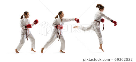 Confident junior in kimono practicing taekwondo combat, martial arts 69362822